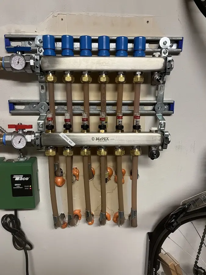 Plumber performing Water Heater Repair at a residential property in Benton City